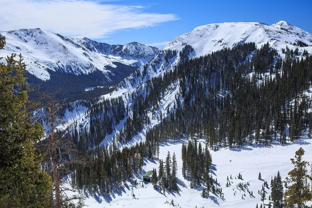Snow-covered runs and a lift station at Taos Ski Valley, the ski area Ernie Blake founded in 1955.